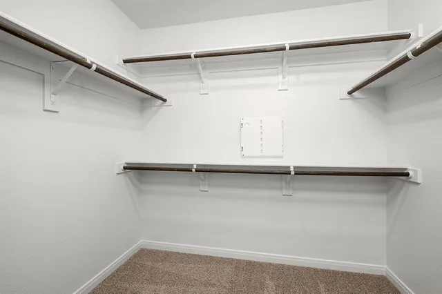 a view of a room with racks on the wall