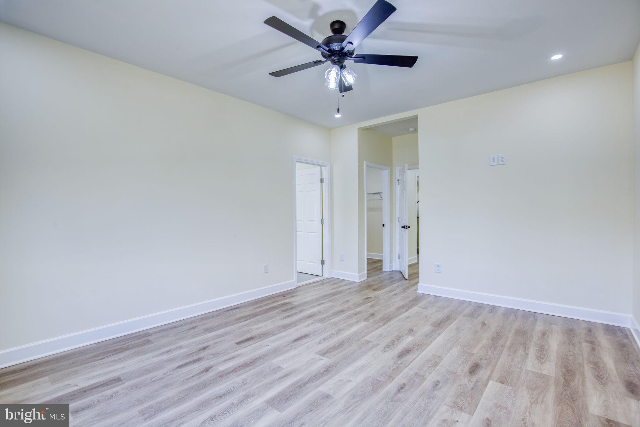 49 Poplar Lane Colonial Beach, VA 22443 - Photo 19 of 42 wooden floor in an empty room