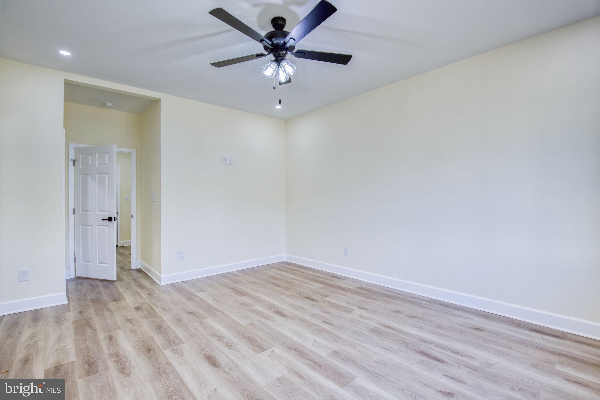49 Poplar Lane Colonial Beach, VA 22443 - Photo 20 of 42 wooden floor in an empty room
