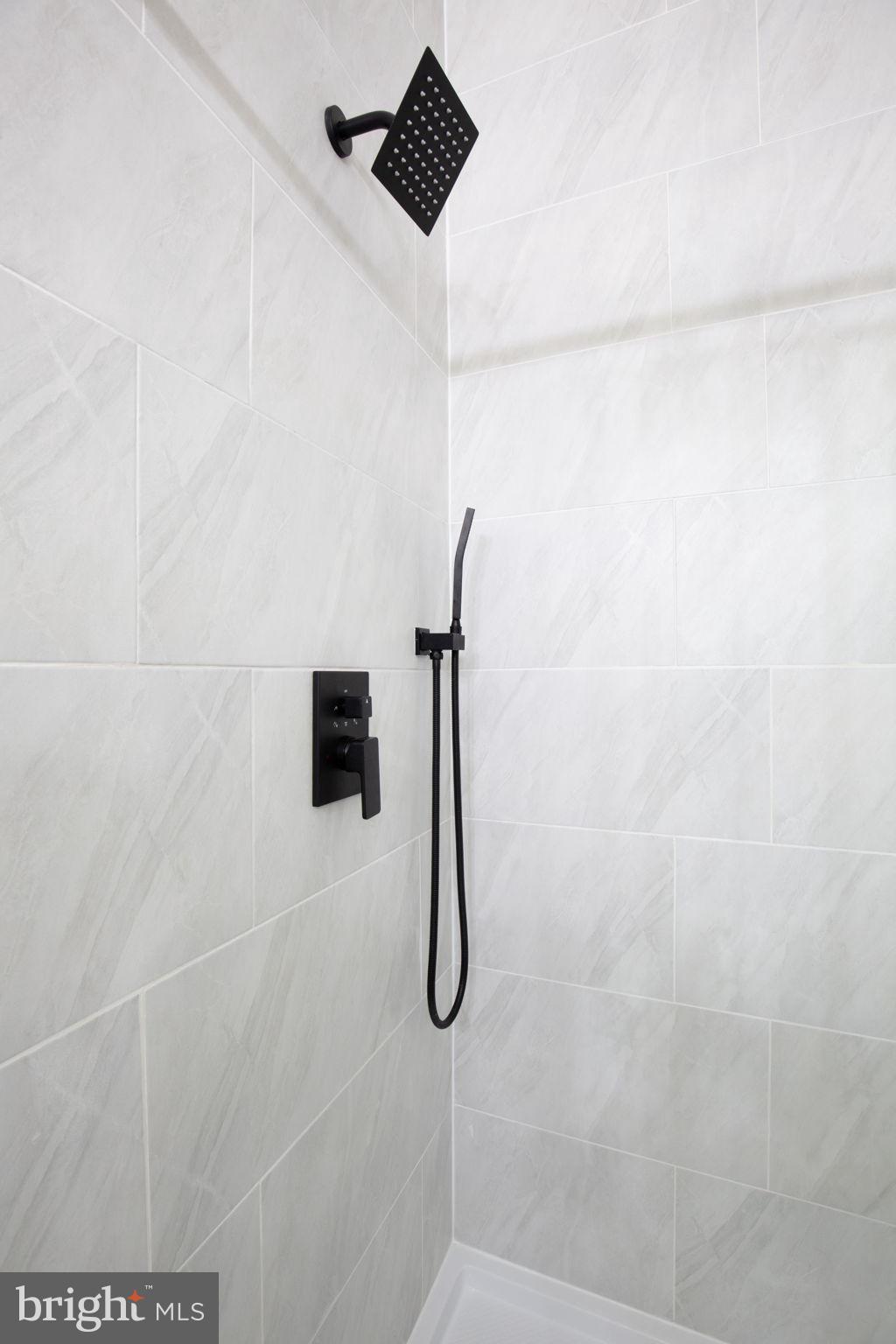 49 Poplar Lane Colonial Beach, VA 22443 - Photo 25 of 42 a bathroom with a shower