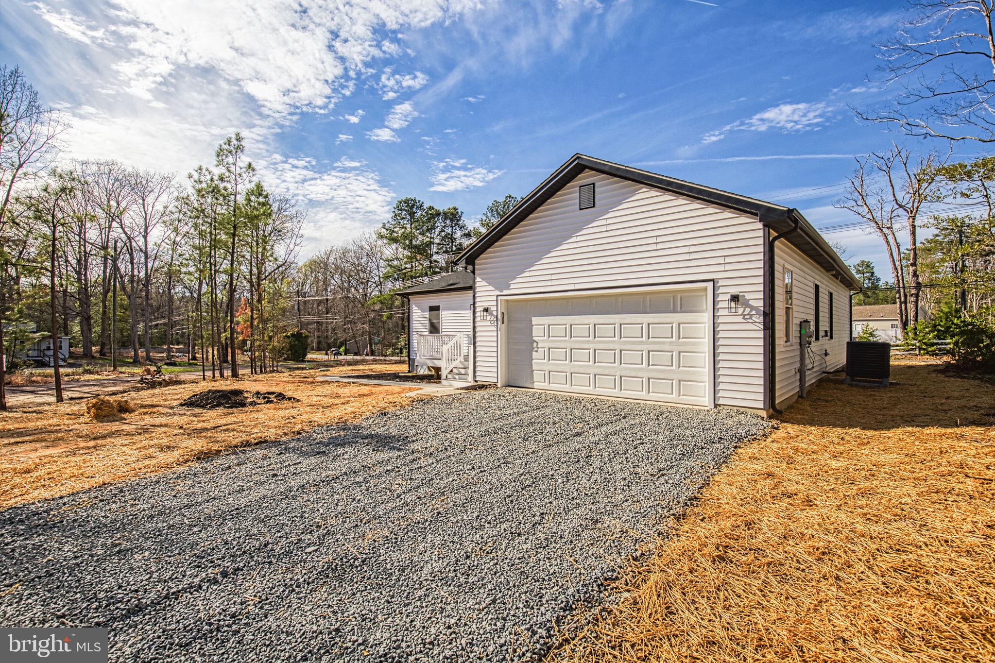 49 Poplar Lane Colonial Beach, VA 22443 - Photo 36 of 42 a view of a house with a yard