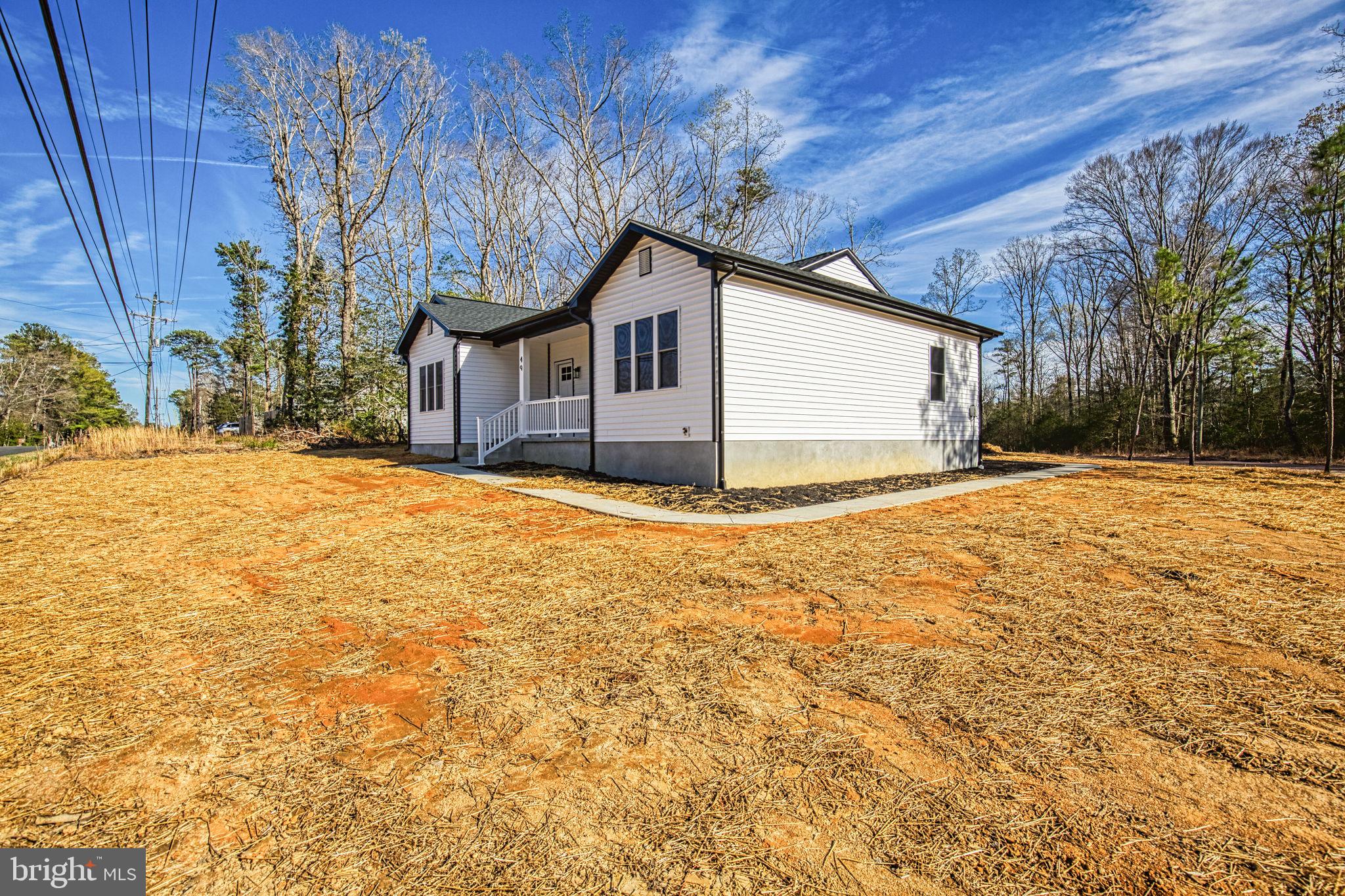49 Poplar Lane Colonial Beach, VA 22443 - Photo 40 of 42 a house view with a outdoor space
