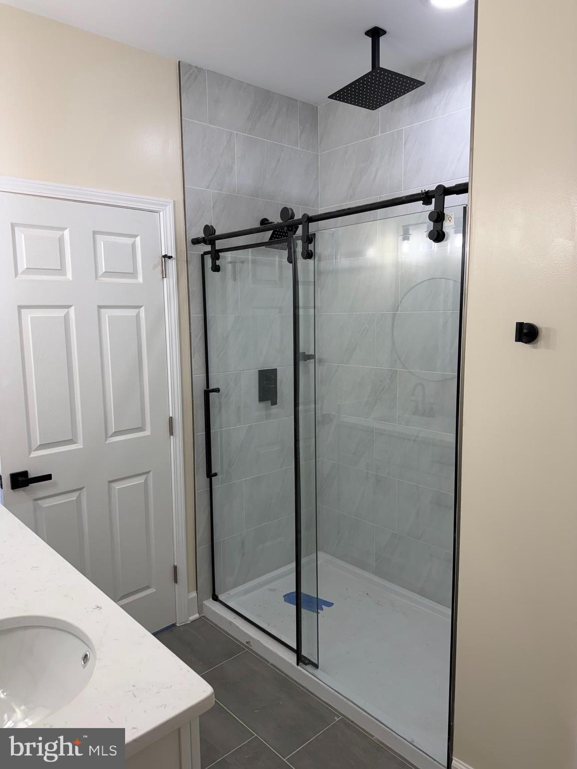 49 Poplar Lane Colonial Beach, VA 22443 - Photo 5 of 9 a bathroom with a shower and a sink