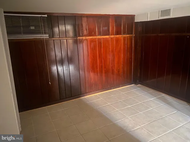 a kitchen with a stove and a refrigerator