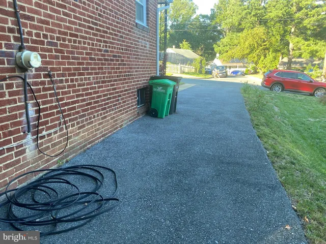 a view of a bench in backyard