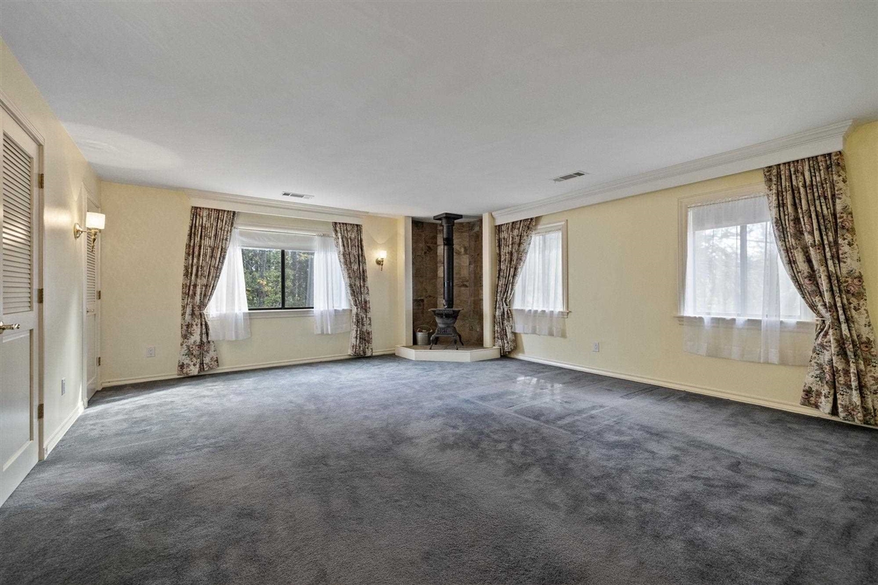 25833 Lyons Dam Road Twain Harte, CA 95383 - Photo 27 of 60 an empty room with windows and closet