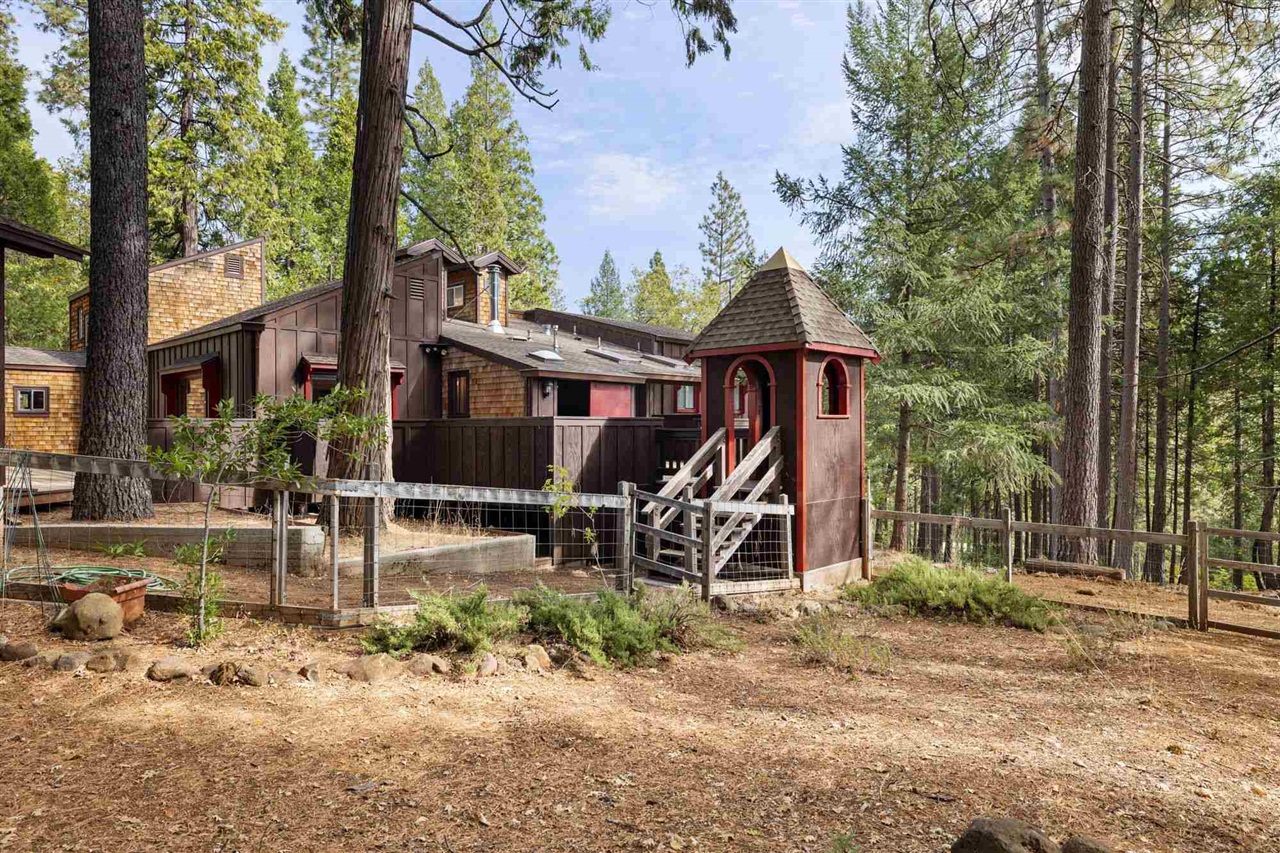 25833 Lyons Dam Road Twain Harte, CA 95383 - Photo 39 of 60 a front view of a house with garden