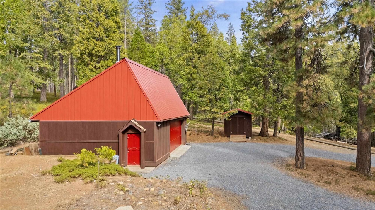 25833 Lyons Dam Road Twain Harte, CA 95383 - Photo 41 of 60 a street view with tall trees