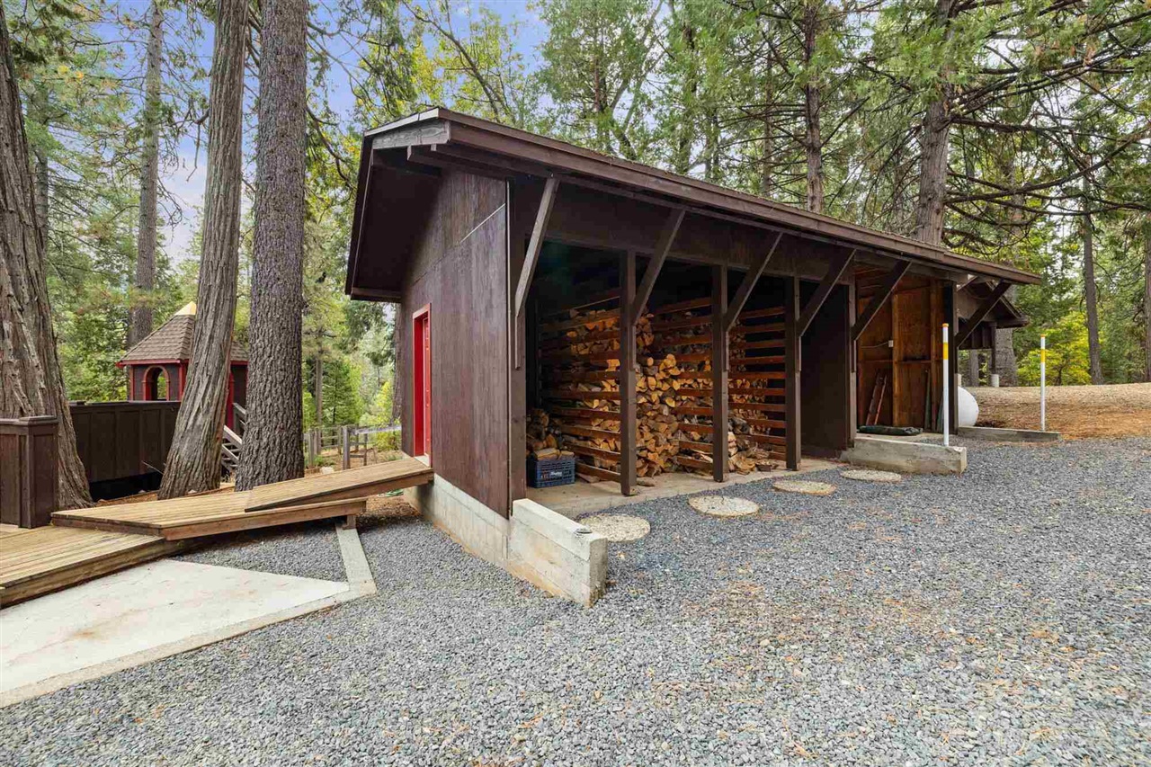 25833 Lyons Dam Road Twain Harte, CA 95383 - Photo 48 of 60 tool storage/shop in back, parking for tractor