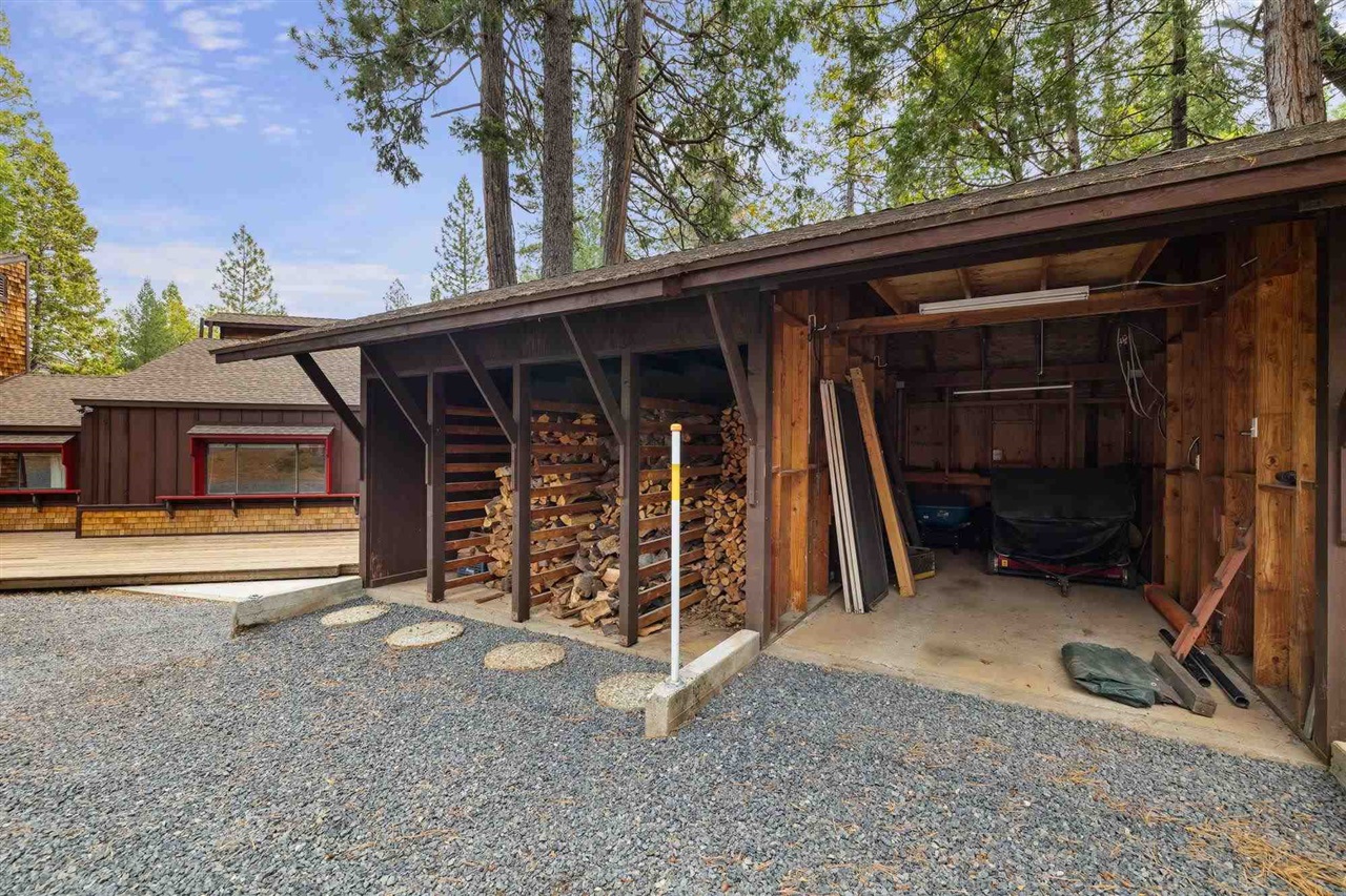 25833 Lyons Dam Road Twain Harte, CA 95383 - Photo 49 of 60 Wood storage, shape and tractor bay/covered parking