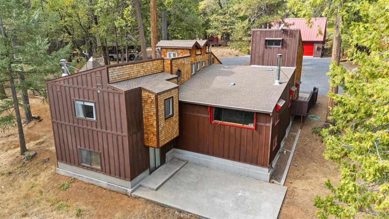 25833 Lyons Dam Road Twain Harte, CA 95383 - Photo 55 of 60 front view of a house with a small deck