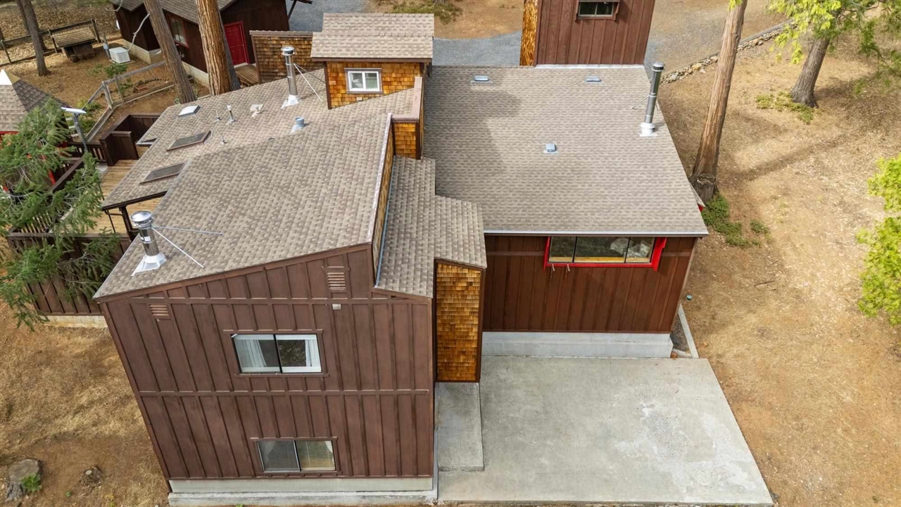 25833 Lyons Dam Road Twain Harte, CA 95383 - Photo 56 of 60 an aerial view of a house with balcony