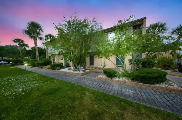 a view of a backyard with a garden