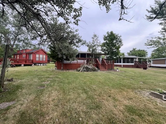 front view of a house with a big yard