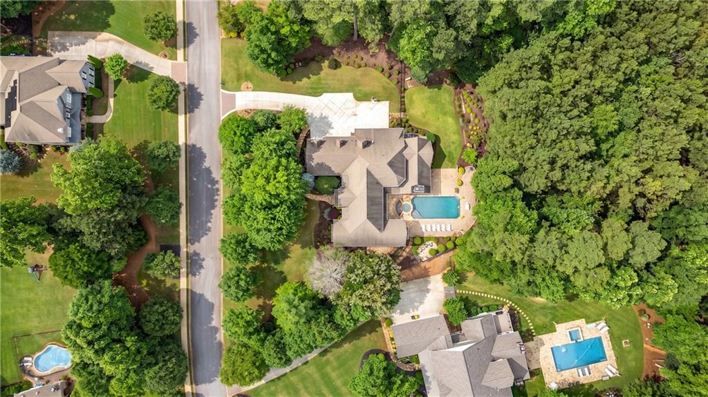 13942 Tree Loft Road Milton, GA 30004 - Photo 88 of 102 an aerial view of a house with a yard