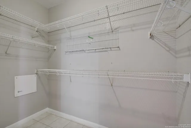 a view of a room with racks on the wall