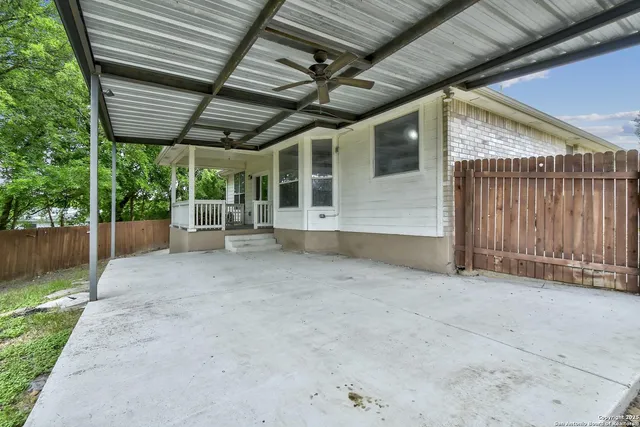 a backyard of a house with lots of green space