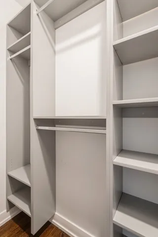 a hallway with closet
