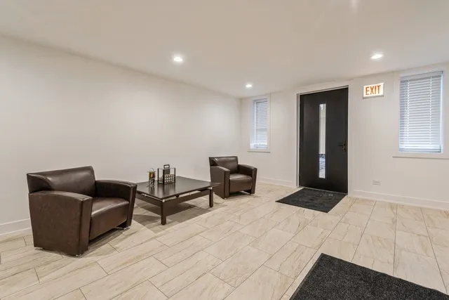 a bedroom with furniture and a couch