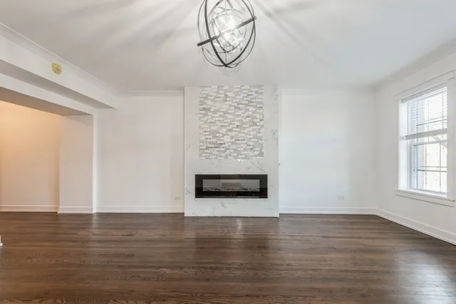 a view of workspace with wooden floor and window