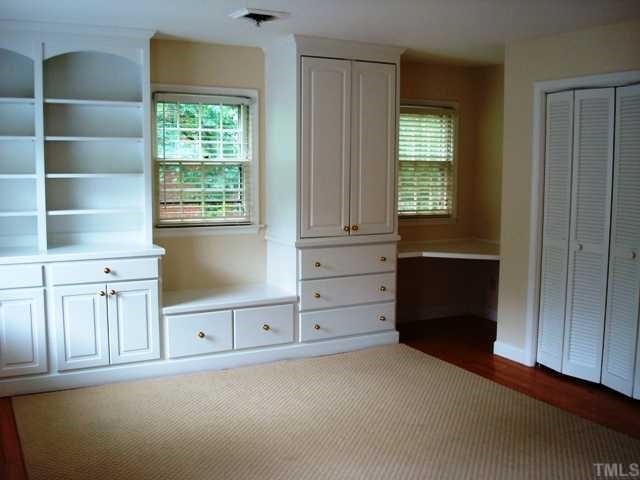 3700 St Marks Road Durham, NC 27707 - Photo 10 of 12 Master Bedroom wall of built-ins. All bedrooms are nice size and provide wonderful light.