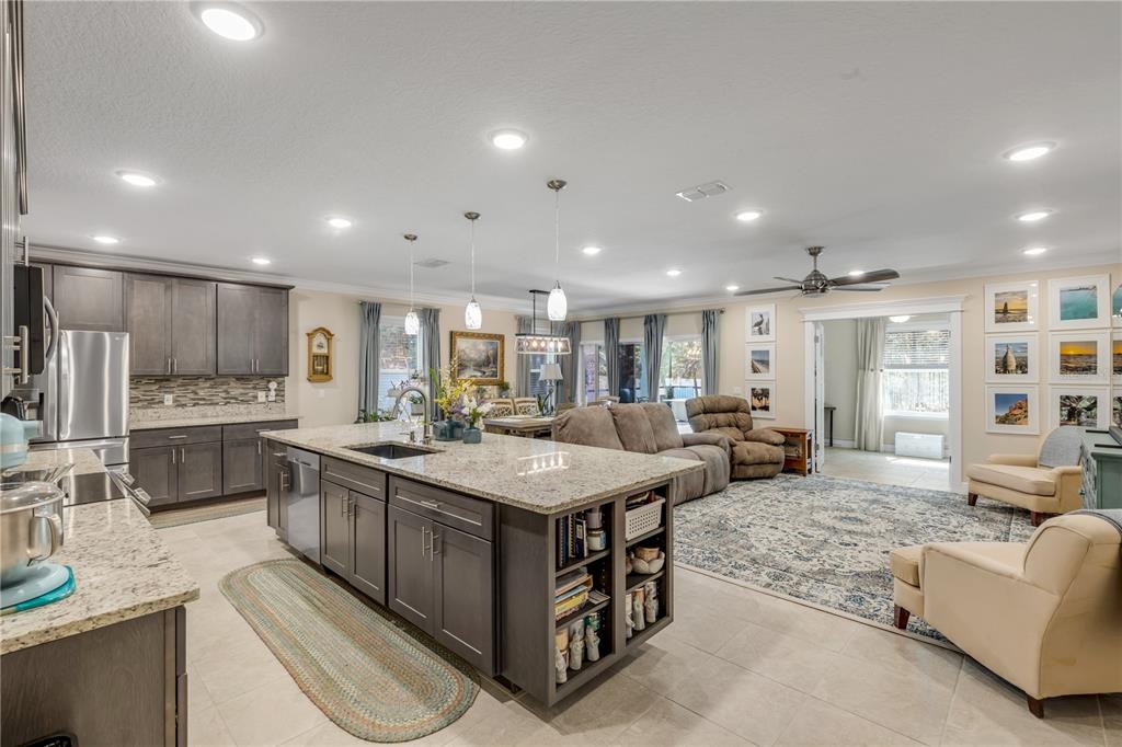 2504 Lime Tree Drive Edgewater, FL 32141 - Photo 16 of 42 a large kitchen with stainless steel appliances lots of counter top space