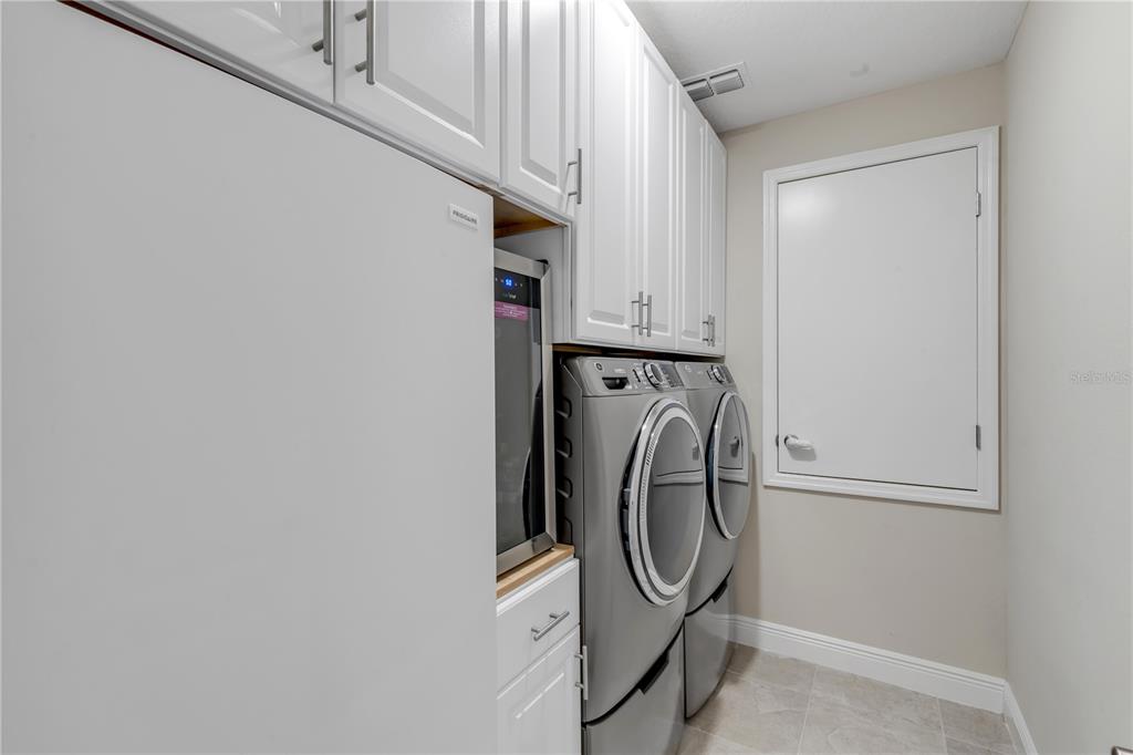 2504 Lime Tree Drive Edgewater, FL 32141 - Photo 17 of 42 a utility room with dryer and washer