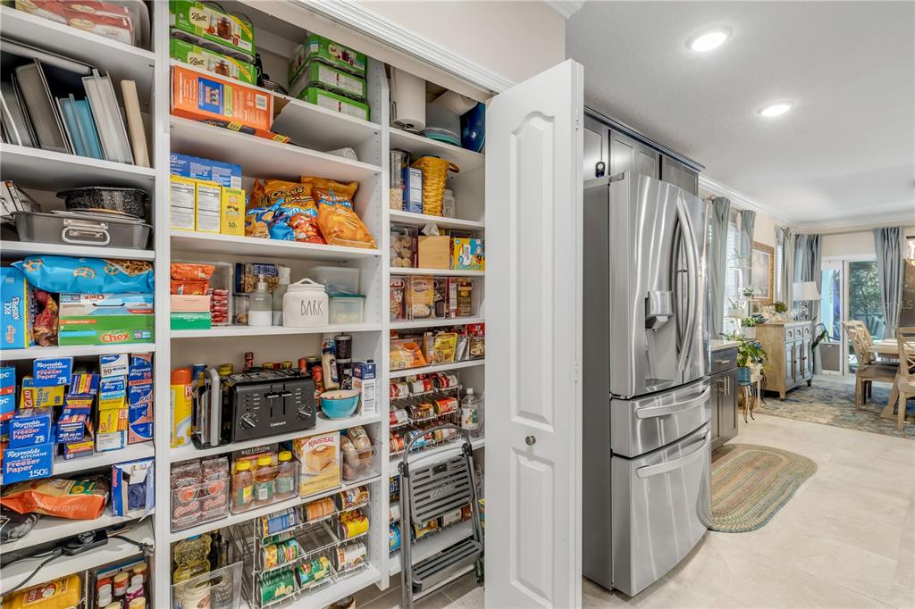 2504 Lime Tree Drive Edgewater, FL 32141 - Photo 18 of 42 a view of walk in closet with clothes and shoes