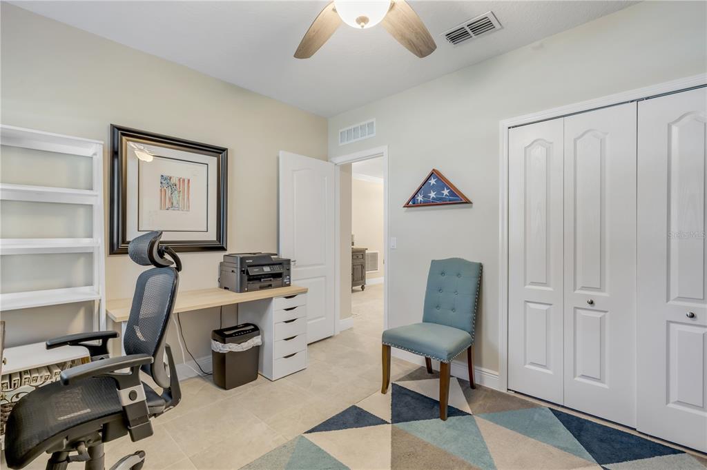 2504 Lime Tree Drive Edgewater, FL 32141 - Photo 22 of 42 a view of workspace with lounge chair and windows