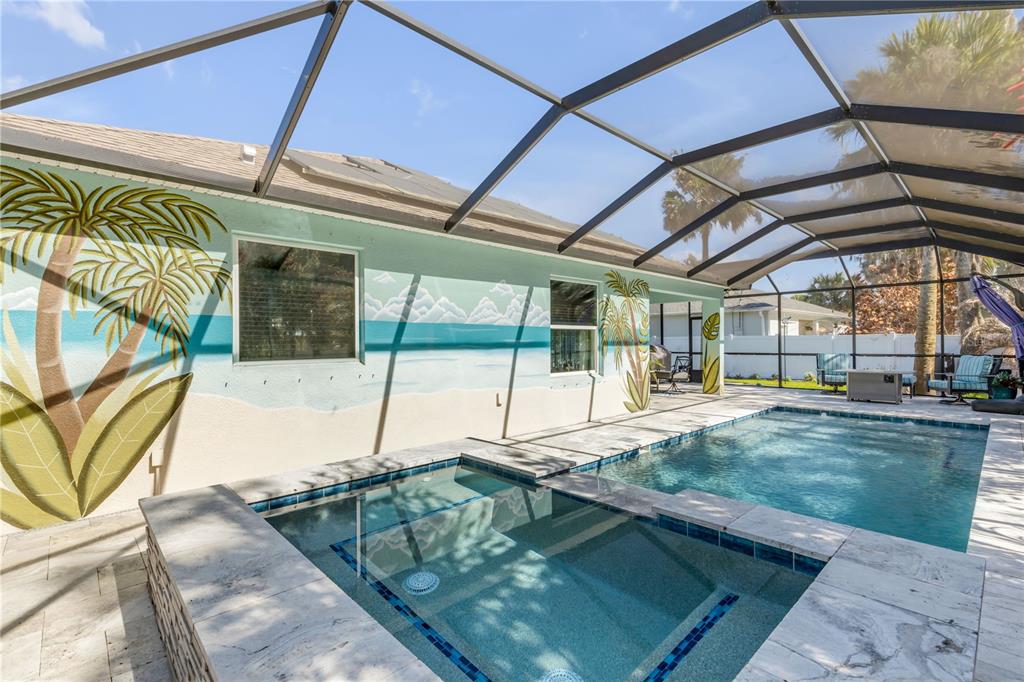 2504 Lime Tree Drive Edgewater, FL 32141 - Photo 38 of 42 a swimming pool with a outdoor seating