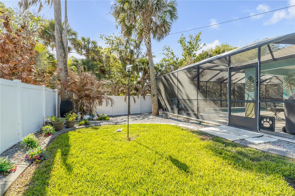 2504 Lime Tree Drive Edgewater, FL 32141 - Photo 40 of 42 a view of a swimming pool with a patio