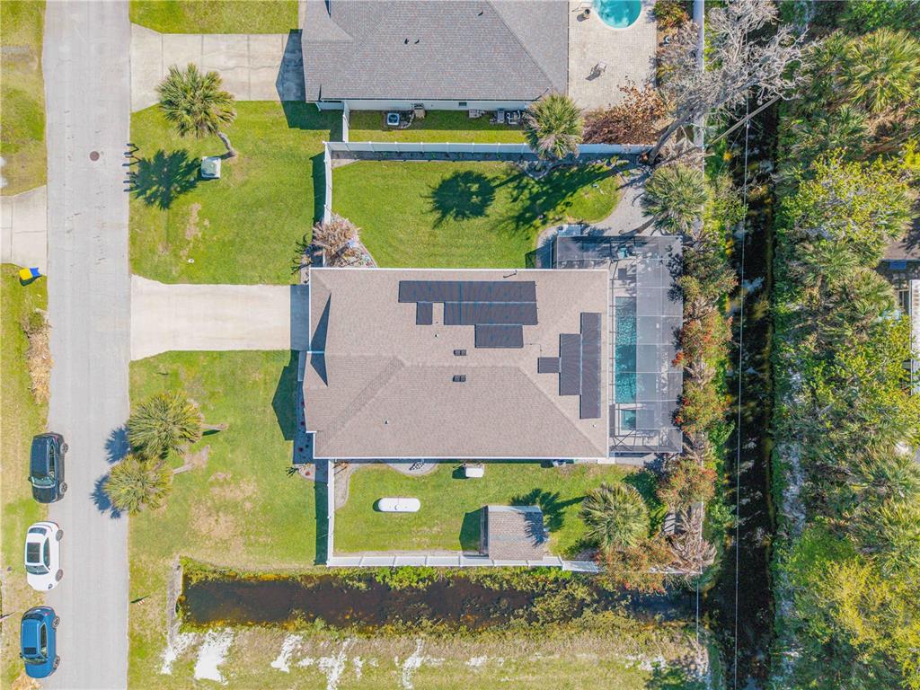 2504 Lime Tree Drive Edgewater, FL 32141 - Photo 41 of 42 an aerial view of a house with swimming pool