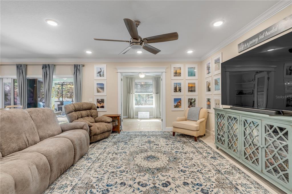 2504 Lime Tree Drive Edgewater, FL 32141 - Photo 8 of 42 a living room with furniture and a large window