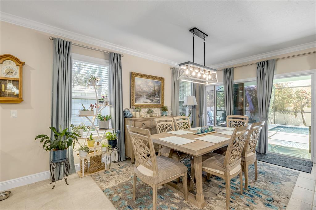 2504 Lime Tree Drive Edgewater, FL 32141 - Photo 9 of 42 a view of a dining room with furniture window and outside view