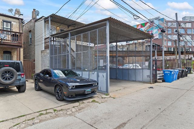 a view of outdoor sitting area with furniture
