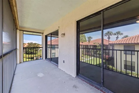 a view of an empty room with a balcony