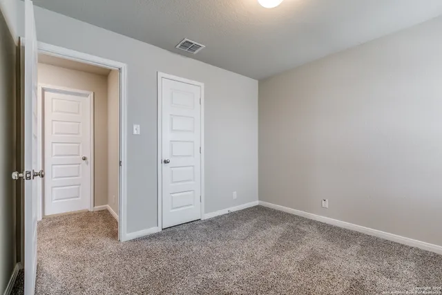 wooden floor and window in a room