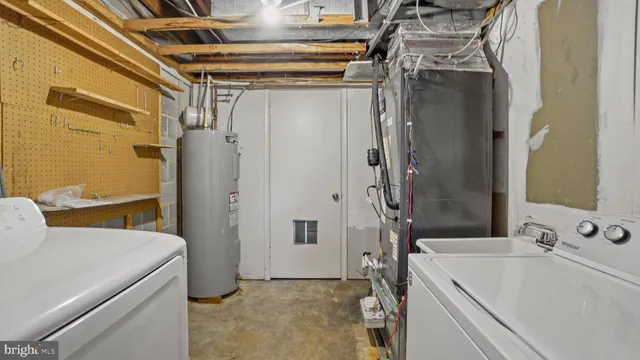 a bathroom with a sink and shower