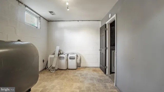 a view of a garage with furniture