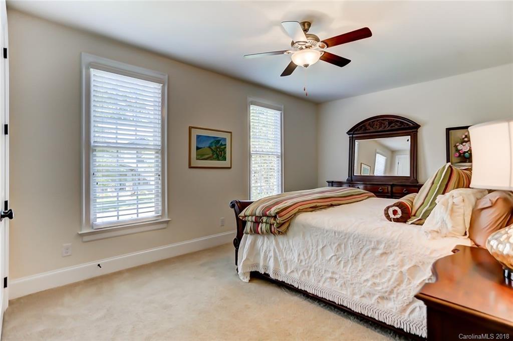 754 Revival Row Fort Mill, SC 29708 - Photo 17 of 35 a bedroom with a bed and a ceiling fan