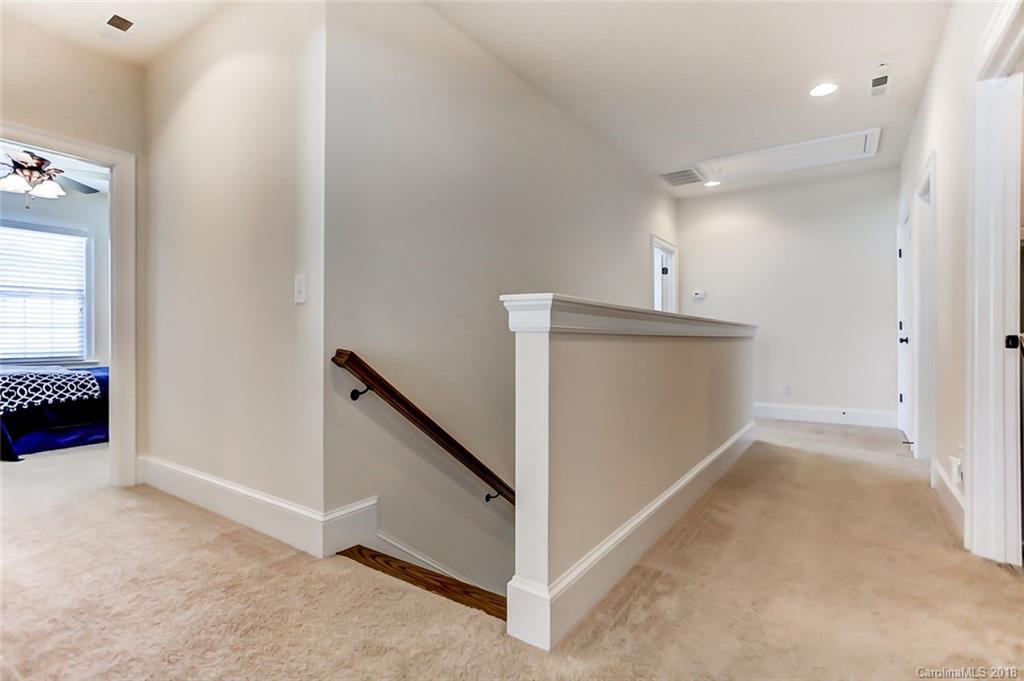 754 Revival Row Fort Mill, SC 29708 - Photo 19 of 35 view of a livingroom with wooden floor and staircase