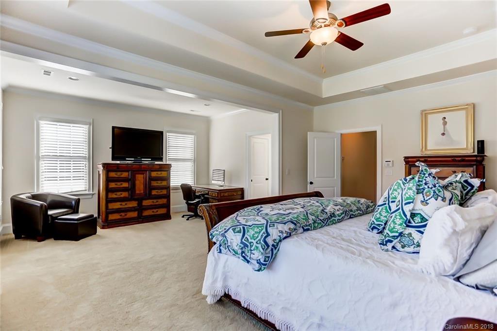 754 Revival Row Fort Mill, SC 29708 - Photo 21 of 35 a bedroom with a bed and furniture