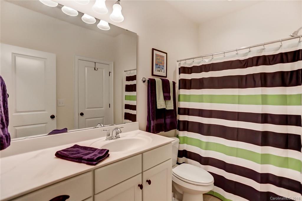 754 Revival Row Fort Mill, SC 29708 - Photo 27 of 35 a bathroom with a sink and a mirror