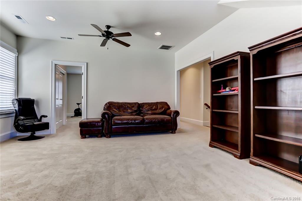 754 Revival Row Fort Mill, SC 29708 - Photo 29 of 35 a living room with furniture and a ceiling fan