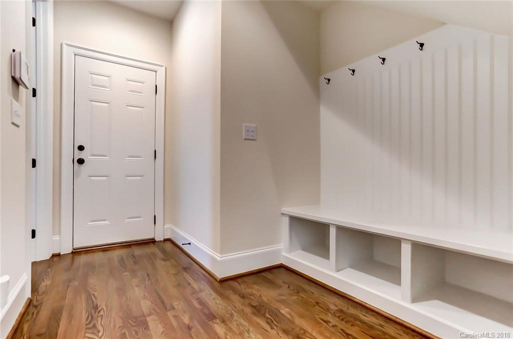 754 Revival Row Fort Mill, SC 29708 - Photo 31 of 35 a view of an empty room with wooden floor
