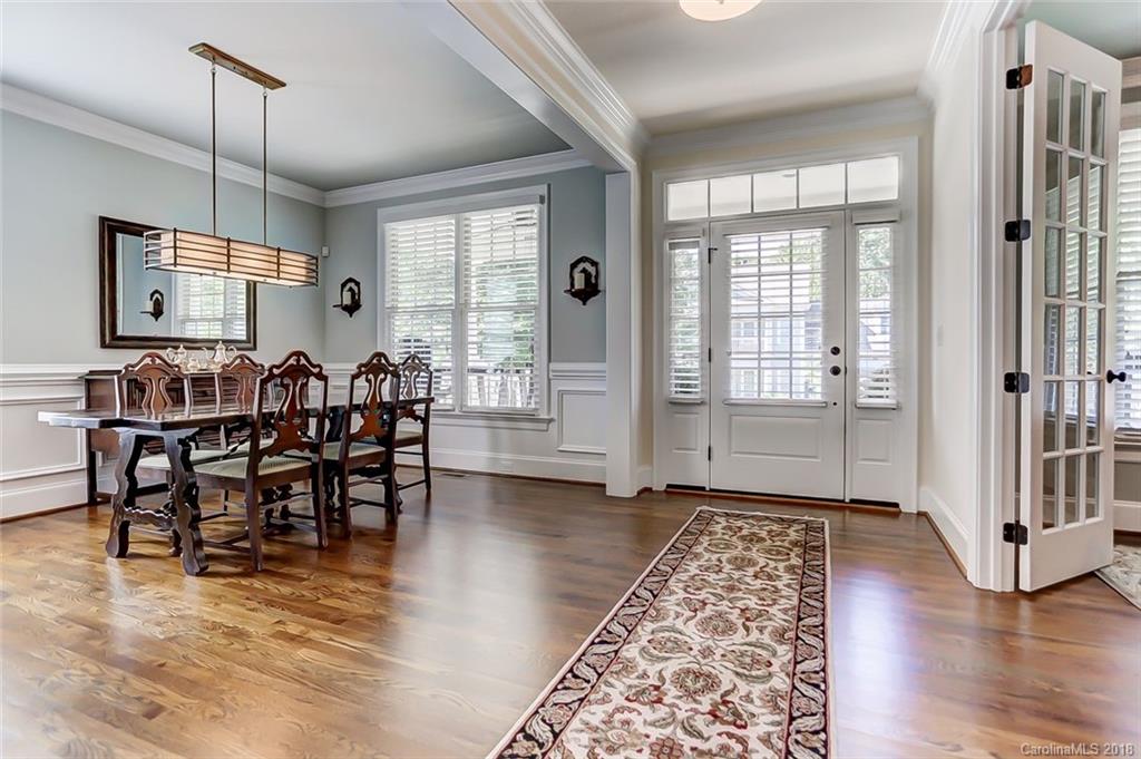 754 Revival Row Fort Mill, SC 29708 - Photo 6 of 35 a view of a dining room with furniture window and wooden floor