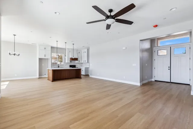 a view of a kitchen with a dishwasher and cabinets