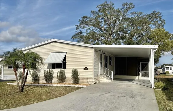 a view of a house with a garage