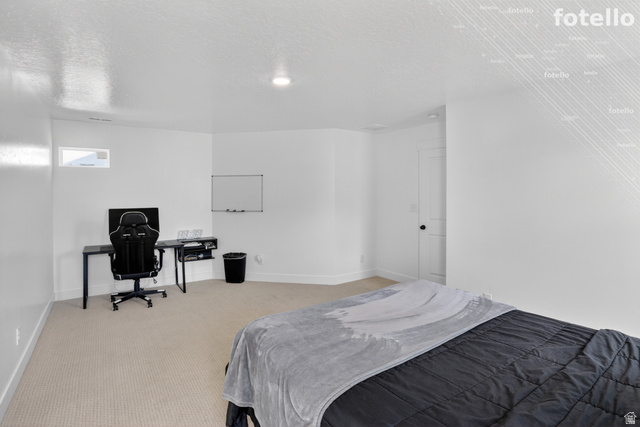 815 West Powderwood Lane Mapleton, UT 84664 - Photo 22 of 39 Carpeted bedroom with a desk and a textured ceiling