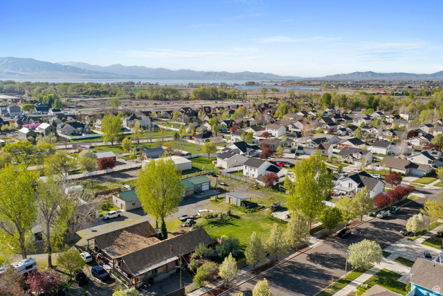 49 North 2830th West, Unit 3 Provo, UT 84601 - Photo 11 of 13 Aerial view of residential area with a mountainous background